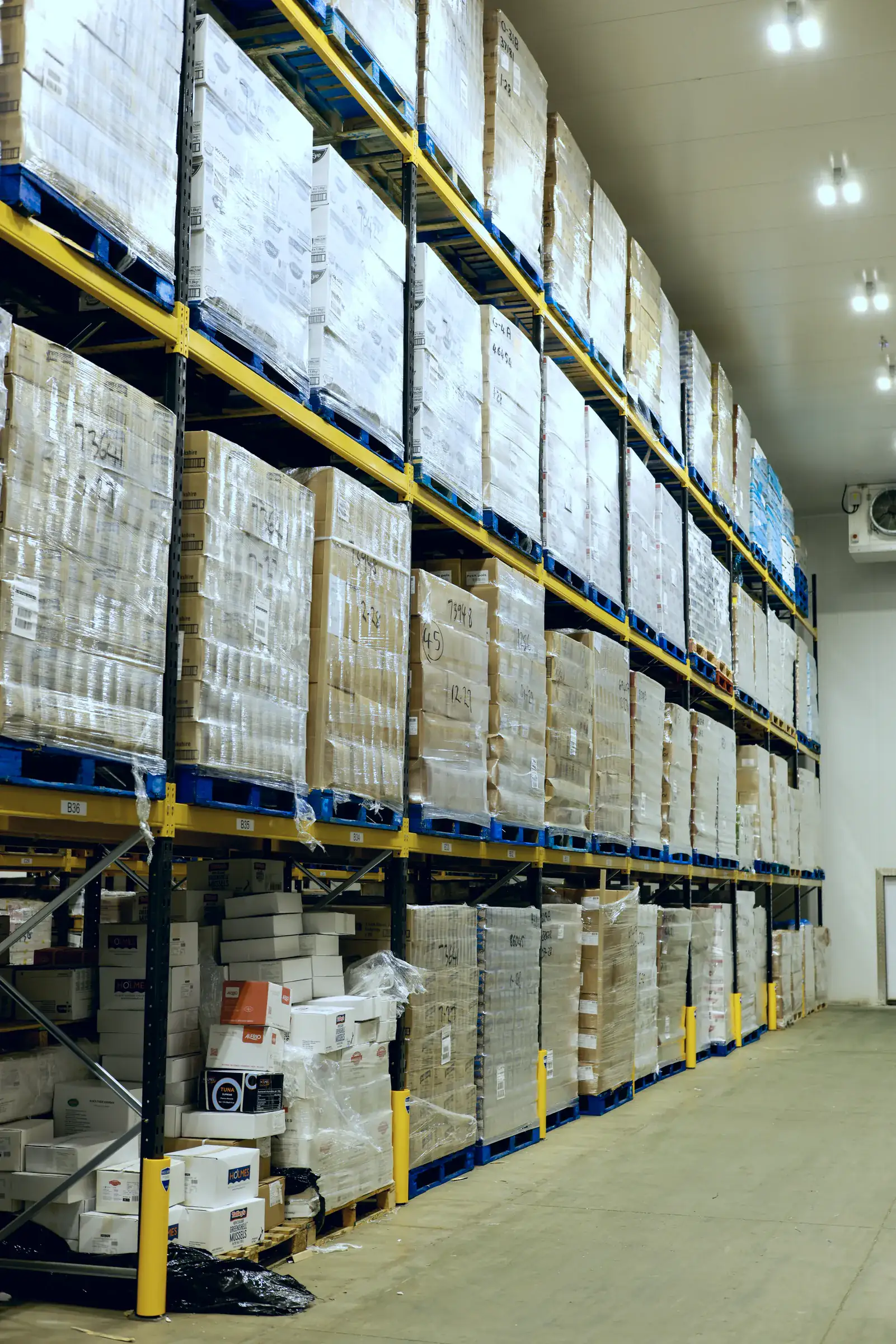 High bay pallet racking full of palletised stock in a cold store